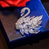 image:imageEnchanted Menagerie Brooch 8 Styles Luxury Animal Brooch Collection Gold Plated Crystal Peacock Swan Phoenix Bee Butterfly Pin for Women Elegant Jacket Blazer Scarf Hat Pin Jewelry GiftWhite Crystal Swan