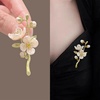 image:imageWCRAZYE Pearl Flower Brooches Pin for Women Girls Gold Plated Fashion Elegant Green Leaf Botanical Floral Lapel Brooch Dress Accessories Cute Wedding Valentines Day Birthday Jewelry Gift SouvenirFlower Brooch 1