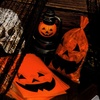 image:imageOutus 150 Pieces Halloween Plastic Candy Bags JackOLantern Pumpkin Bags Goody Tote Bag Party Favor with Handles Party FavorsOrange with Black Accents