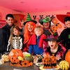image:imageOutus 150 Pieces Halloween Plastic Candy Bags JackOLantern Pumpkin Bags Goody Tote Bag Party Favor with Handles Party FavorsOrange with Black Accents