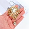 image:imageYARIEW Brooches for Women Silver Plated Vintage Rhinestone Brooch Pins for Women Flower Brooch for Business Bouquet St Patricks Day Holiday Christmas GiftChampagne