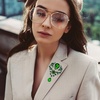 image:imageYARIEW Brooches for Women Silver Plated Vintage Rhinestone Brooch Pins for Women Flower Brooch for Business Bouquet St Patricks Day Holiday Christmas GiftGreen